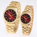 Detailed view of elegant gold couple watches featuring deep red sunburst dials and steel bands - Male Style / Gold Red Face
