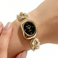 Montre à quartz élégante pour femme avec bracelet chaîne dorée et cadran ovale noir - Boîtier Doré Cadran Noir