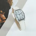 Detailed close-up of XAPWV tonneau-shaped watch with white leather strap - Men's (White Strap Silver Case)