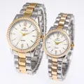 Close-up of two-tone silver and gold quartz couple watch set with white dials - Men Two-tone White