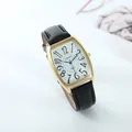 Detailed close-up of a stylish tonneau-shaped gold watch with a premium black leather strap - Men's (Black Strap Gold Case)