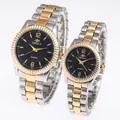 Elegant two-tone gold and silver steel quartz couple watches with black dial markers. - Men Two-tone Black