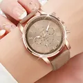 Close-up of Geneva women's quartz watch with rose gold case and khaki leather strap - Beige