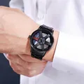 Close-up of a men's quartz watch featuring a creative black car wheel rim dial - Blue (GS734)