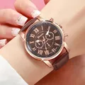 Close-up view of Geneva women's watch with brown leather strap and Roman numeral dial - Coffee