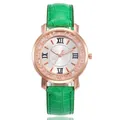 Elegant rose gold lady's watch featuring a vibrant green crocodile strap and sparkling crystal bezel - Green
