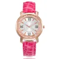 Detailed view of rose gold women's watch with pink crocodile strap and rhinestones - Rose Red
