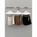 High-waisted linen wide-leg shorts with woven belts in linen apricot, khaki, and black - S / Bottoms / Black