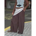 Womens loose brown wide leg trousers with decorative waist scarf in urban street setting - Wine Red (Without Scarf)