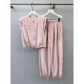 Ensemble deux pièces rose avec gilet zippé à col rond décontracté et pantalon assorti - M / Hauts / Rose