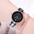 Reloj de cuarzo GEDI para mujer con esfera negra y correa de acero plateado - Caja Plateada Esfera Negra Correa Negra