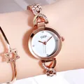 Elegant rose gold women's quartz fashion watch with a small white diamond-set dial. - Rose Gold Case White Dial Rose Gold Strap