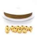 Set di filo in acciaio inossidabile dorato e 10 perle tonde per gioielli fai-da-te - 1 Rotolo di Filo Con 10 Perline / 0,45 mm / Oro