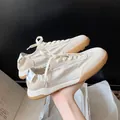 Breathable off-white cream ballet-style German training sneakers with brown gum sole. - 34 / Off White