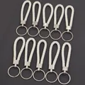Lot de 10 cordons en cuir PU tressé blanc avec anneaux porte-clés en métal argenté - 10 Pièces/Paquet (Longueur env. 11.5cm) / Blanc