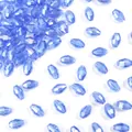 Perle di cristallo sfaccettate a goccia blu chiaro per creazione di gioielli fai da te - 50 Pezzi/Confezione (6x8mm) / Riso Ovale Sfaccettato Blu