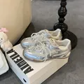 Silver metallic leather ballet style sneakers featuring elegant pearl lace detailing - 35 / Silver