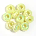 Iridescent light yellow UV-plated acrylic beads with large hole for DIY jewelry making. - Iridescent Yellow (UV Plated) / Outer Diameter Approx. 14mm, Thickness Approx. 7mm, Hole Diameter Approx. 5.4mm