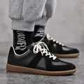 Klassieke zwarte Duitse legertrainers met suède panelen en gumzool voor dagelijks gebruik - 38 / Zwart
