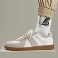Vintage witte sneakers met grijze suède details en een klassieke bruine rubberen zool - 36 / Grijswit