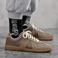 Premium retro bruine GAT-sneakers voor heren en dames in een suède en lederen mix - 38 / Bruin