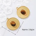 Gold-plated stainless steel pendant with tiger eye stone and sunburst pattern detail - Ripple Disc