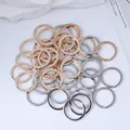 Close-up view of premium gold and silver alloy split rings for DIY keychain craft projects - Split Rings (250926-1) / Outer Diameter 25mm / Inner Diameter 21mm / Gold
