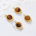 Detailed view of gold-plated tiger eye stone pendants for DIY jewelry necklace making - Irregular Oval Shape