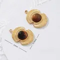 Detailed macro view of 18K gold plated stainless steel tiger eye stone pendants for DIY - Double Fan