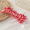 Close-up of red and white houndstooth 5mm paracord rope for DIY crafts and lanyards. - 1 Meter (Trial Version) / Red and White Houndstooth