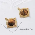 Detail view of two tiger eye stone pendants showing exact dimensions and weight information - Woven Border Round