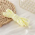 Close-up detail of yellow and white houndstooth paracord with 5mm braided texture for DIY crafts - Creamy Yellow & White Houndstooth