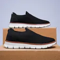Ademende zwarte fly-knit herensneakers met een comfortabele witte dempende loopzool - 39 / Zwart