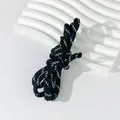 Macro detail view of 5mm black and white woven polyester rope for DIY craft accessories - 100 Meters / Black