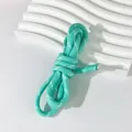 Close-up of 5mm mint green braided polyester cord for DIY handmade jewelry - Trial Style / 1 Meter / Cyan
