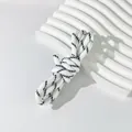 Detail view of 5mm white and black braided polyester rope for DIY crafts and bag straps. - 100 Meters / White