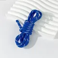 Close-up detail of 5mm royal blue braided polyester rope with white patterns for DIY crafts - Trial Style / 1 Meter / Dark Blue