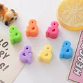 Close-up of 6mm candy-colored acrylic ampersand beads for DIY jewelry making. - Symbol & / 6mm Aperture / Multicolor