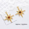 Detailed macro view of 18K gold plated star pendant with tiger's eye stone and measurements. - Starburst
