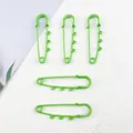 Detailed view of bright green 6cm large safety pins with 3 loops for DIY keychain accessories - Lacquered Large Pin / 5 Pieces / Green