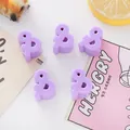 Detailed view of purple 6mm acrylic ampersand beads for DIY jewelry making. - & Symbol (6mm Hole) / Purple