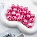 High quality detail of iridescent pink acrylic round beads with 3mm holes in tray - Rose Red