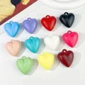 Detailed view of colorful acrylic heart charms for DIY jewelry and keychains. - Glossy Mixed Colors