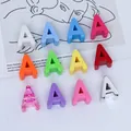 Detailed close-up of vibrant 6mm acrylic letter A charms in multiple colors for DIY crafts - Letter A / 6mm Aperture / Purple