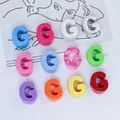 Macro view of colorful acrylic G letter beads in various shades for DIY jewelry making - Letter G / 6mm Aperture / Purple