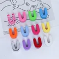 Close-up of colorful 6mm acrylic U-shaped beads for vibrant DIY jewelry making. - Letter U / 6mm Aperture / Purple