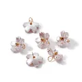 Detailed macro view of iridescent pink ABS pearl flower charms with gold jump rings - Iridescent Cherry Blossom (11*11.5mm) / 10 Pieces Pack / Light Coffee (4656)