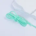 Detaillierte Makroansicht der 2,5 mm minzgrünen koreanischen Wachskordel für DIY-Projekte. - Blaugrün