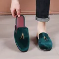 Premium dark green velvet men's mules featuring a gold horn ornament for casual style - 39 / Green