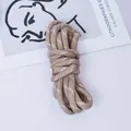 Macro view of 5mm khaki braided polyester cord with white dotted pattern for DIY - Trial Style / 1 Meter / Tan